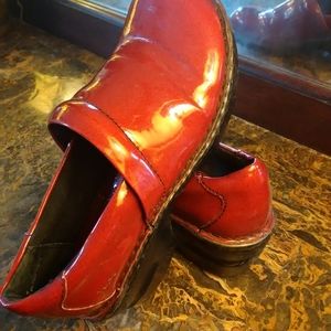 Fire engine red Boc slip ons with durable wedge